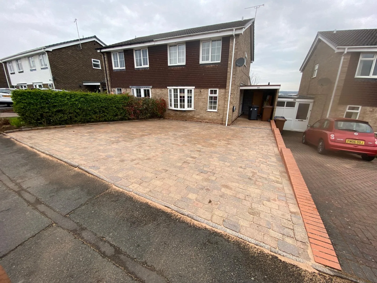 Block paving driveway after cleaning in Kings Bromley