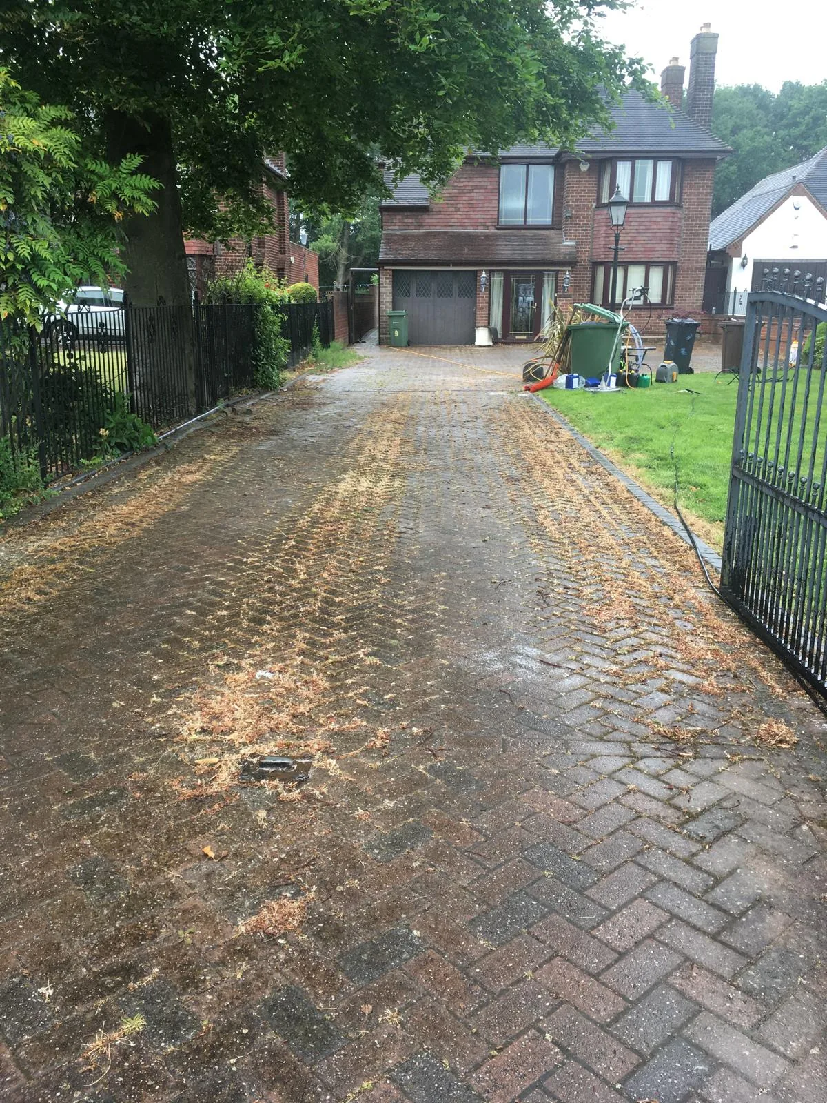 Block paving driveway covered in moss before cleaning in Wolverhampton