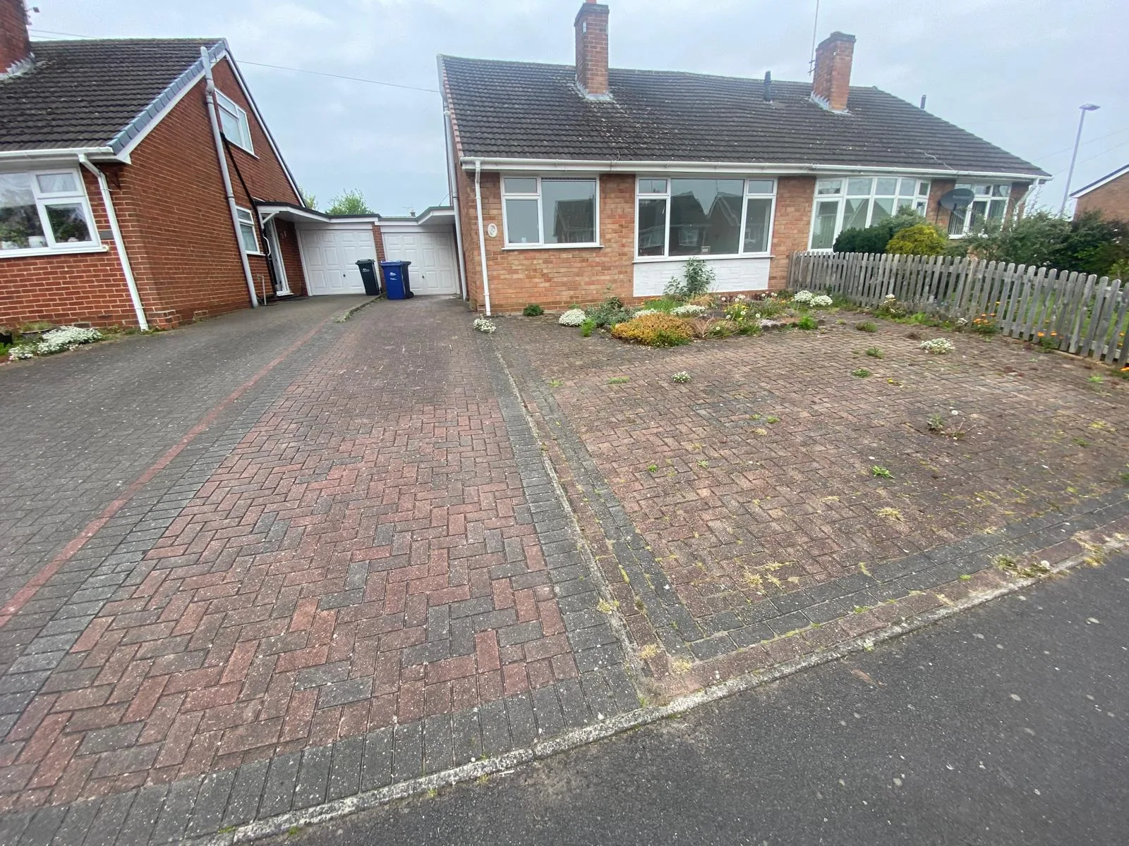 Bungalow driveway before cleaning