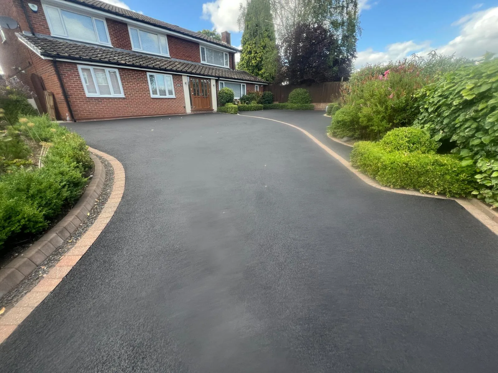 Concrete surface recoloured and resealed to like-new finish