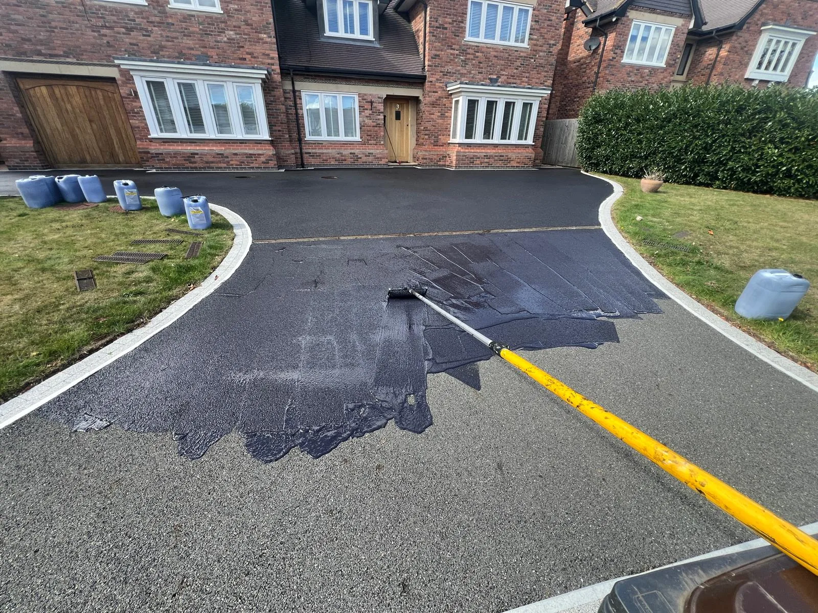 Faded worn concrete surface before recolouring