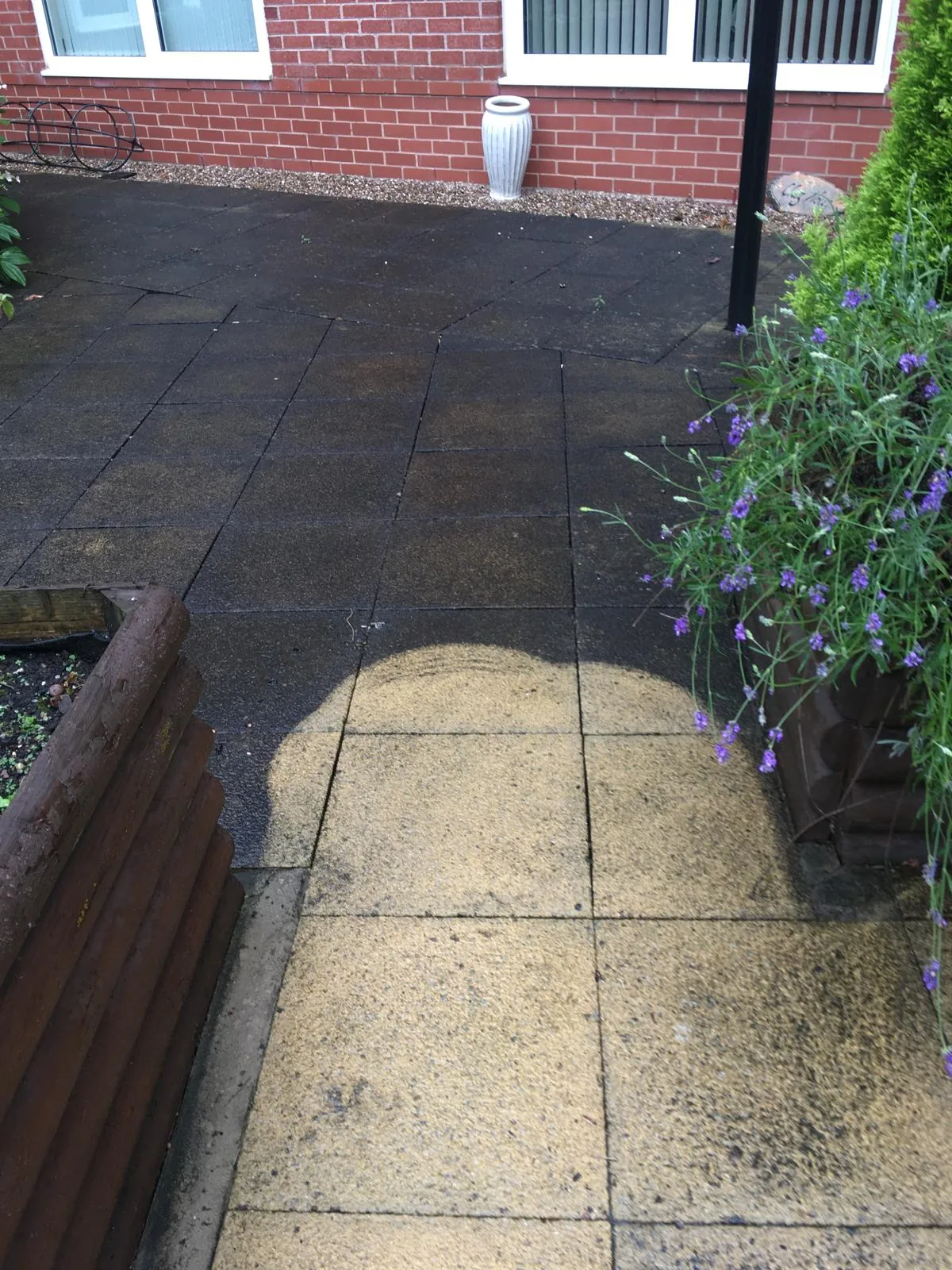 Concrete surface cleaned and colour restored after resealing