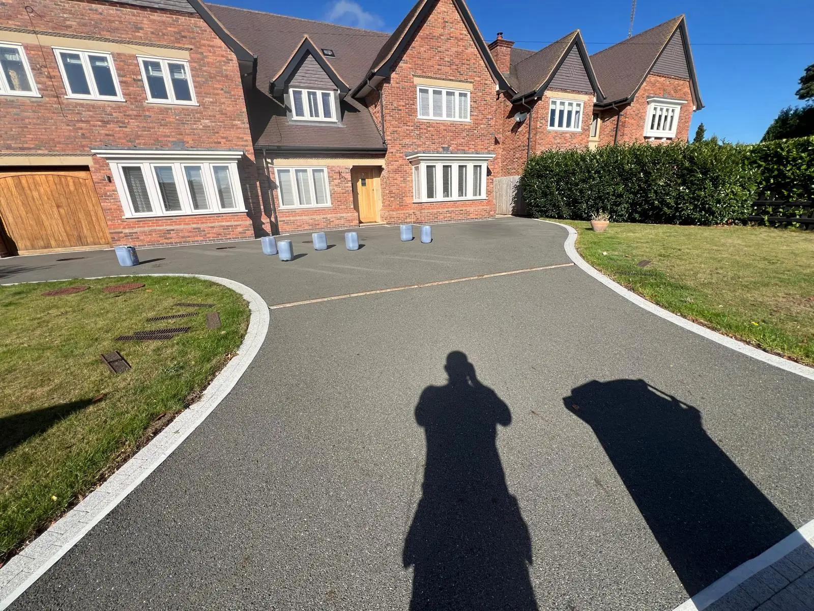 Large double tarmac driveway fully restored to jet black on detached property